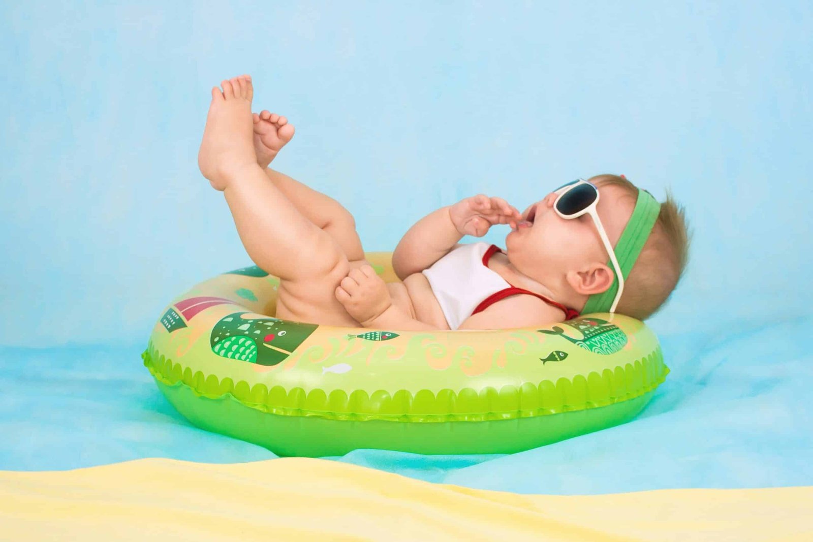 baby lying on inflatable baby lying on inflatable ring