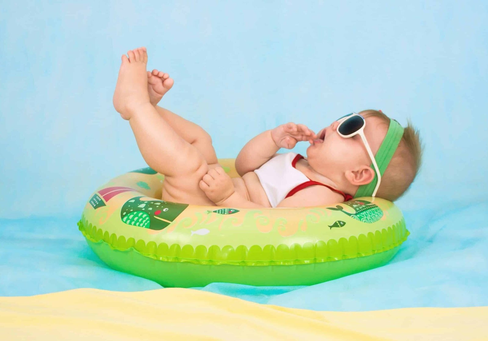 baby lying on inflatable baby lying on inflatable ring